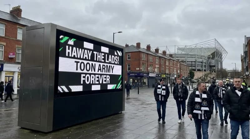 Football banter on a digital screen near St James' Park