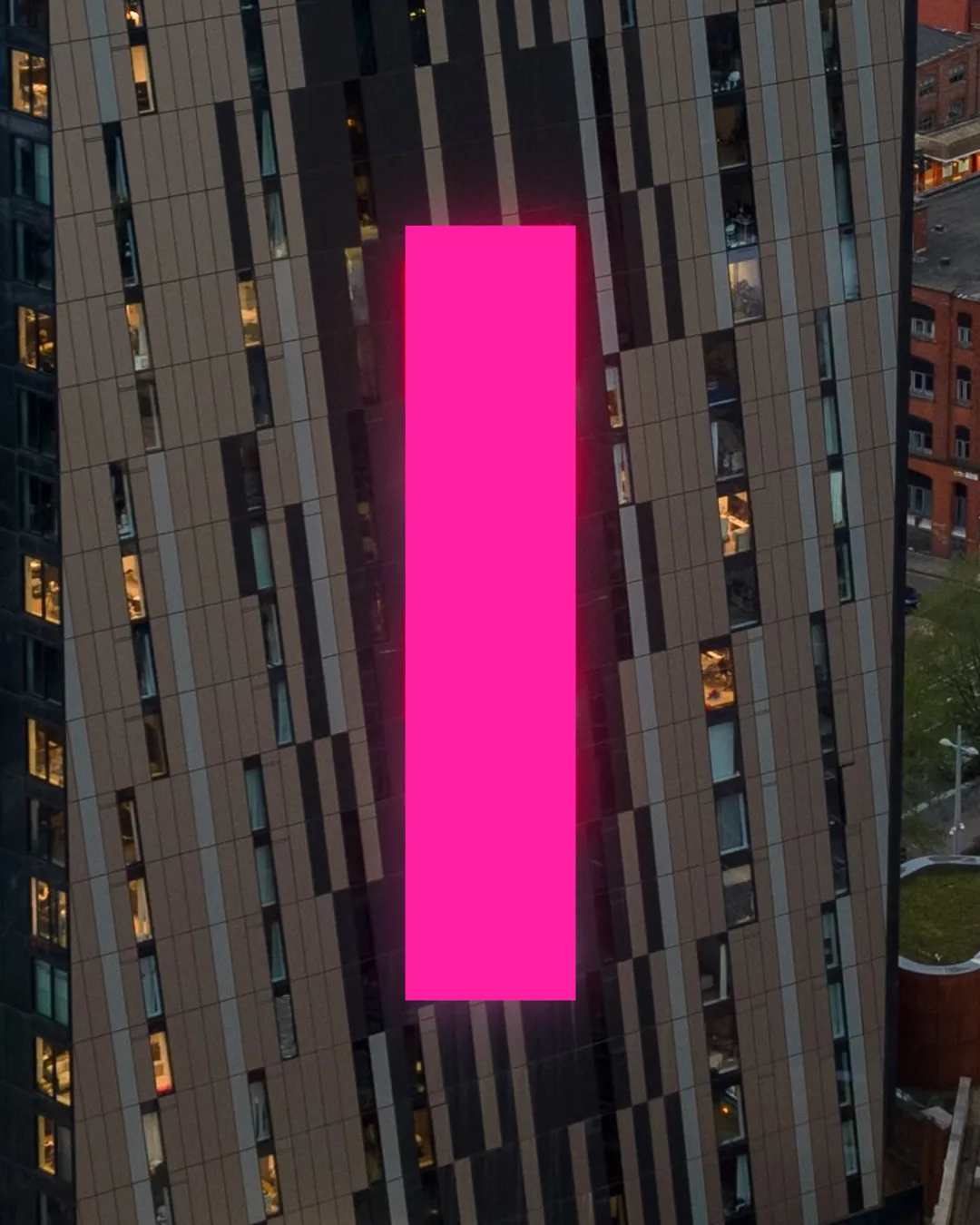 Axis Tower, Manchester, with your message on its screen